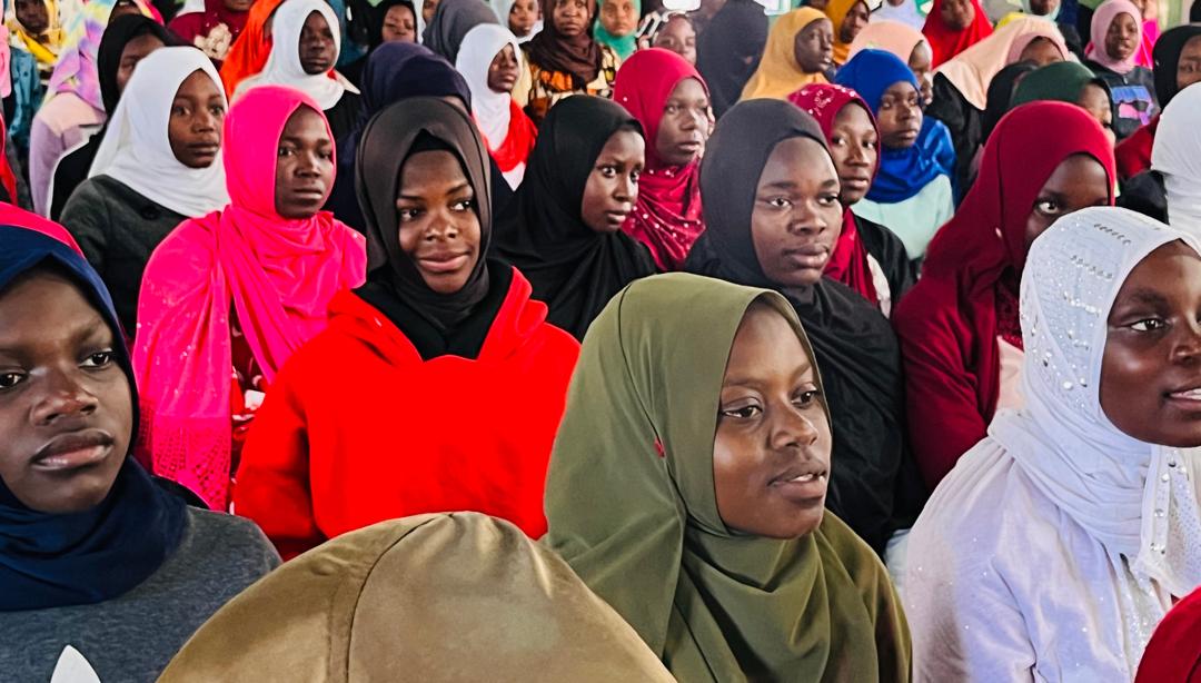 Muslim school girls listening attentively to a lecture during the MUSYO Bi-Annual Sisters camp in Mulanje, Malawi